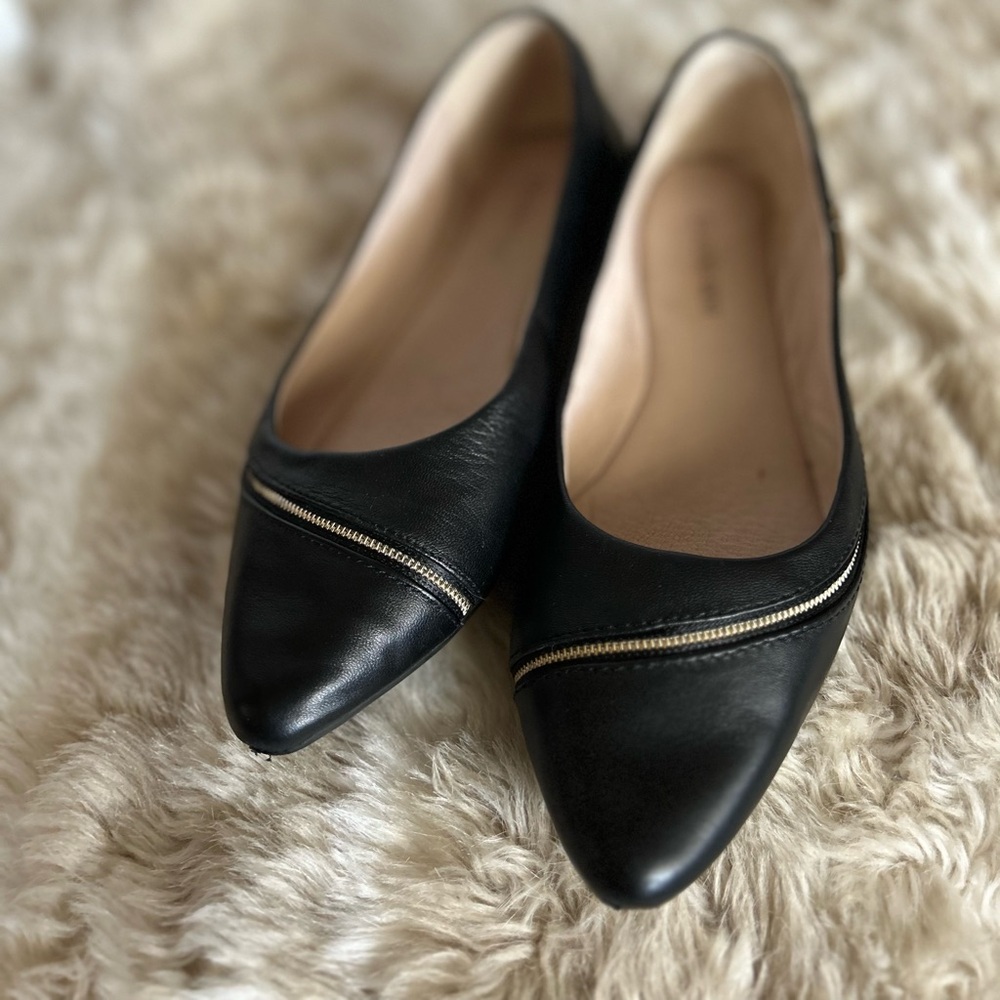 Gianni Bini Black Flats with gold zipper embellishment. Size 6